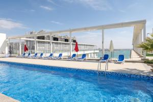 Photo #4 of Luxury 1BR Beachfront Apartment Marjan Island in Jazeerat Al Marjan, United Arab Emirates