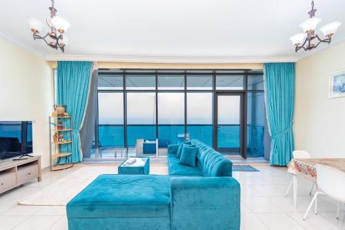 Photo #2 of Beachfront holiday homes with beach,sauna,jacuzzi,cafe,restaurants and more in Ajman, United Arab Emirates