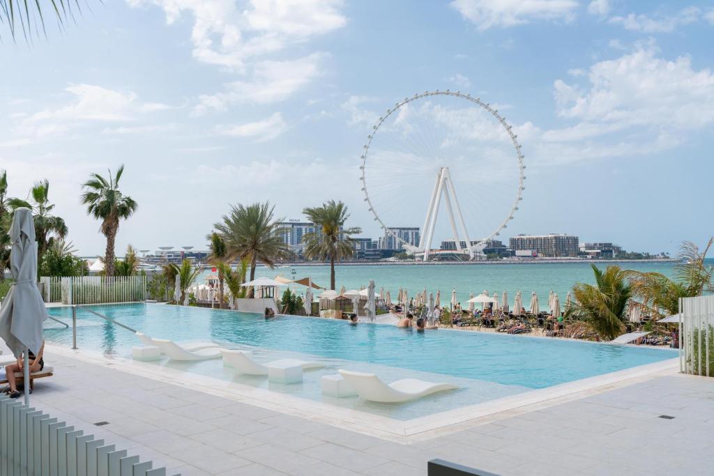 Photo #1 of Luxurious 1BR Suite at La Vie, JBR - Free Private Beach Access - Ahlan HH in Dubai, United Arab Emirates