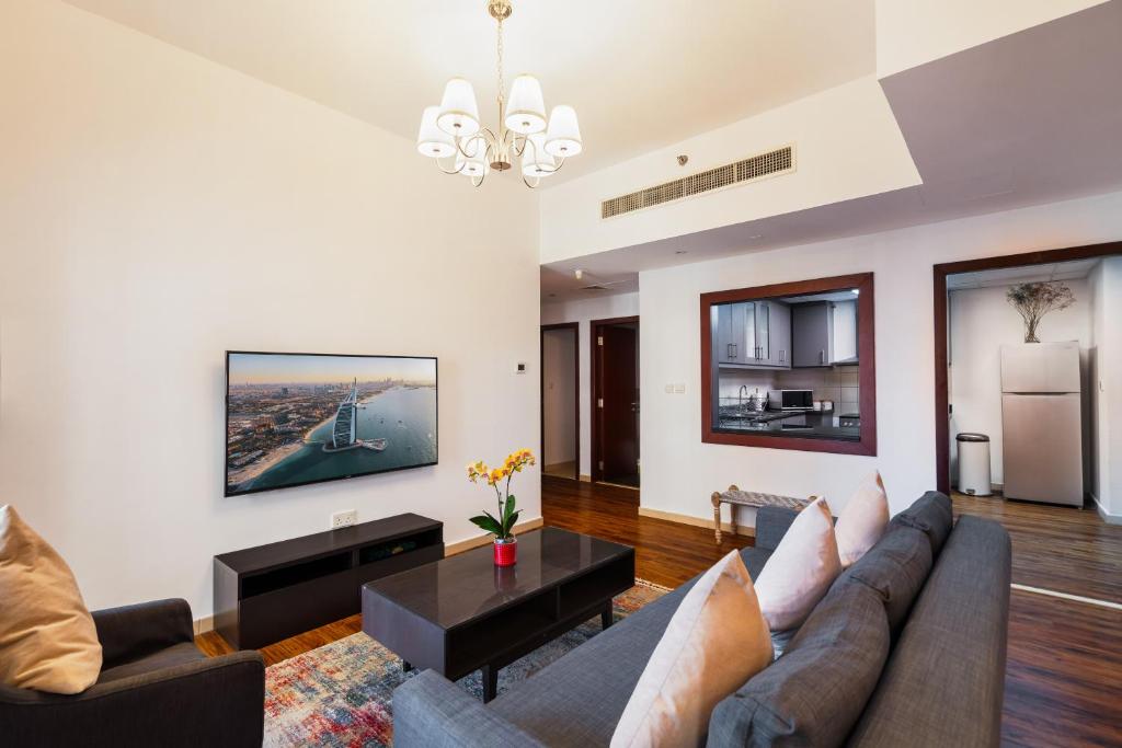 Photo #1 of Specious 5BR plus Maid Room on JBR Beach Prime Location! Walk to The Mall, Dining & Entertainment - By Sunkissed Holiday Homes in Dubai, United Arab Emirates