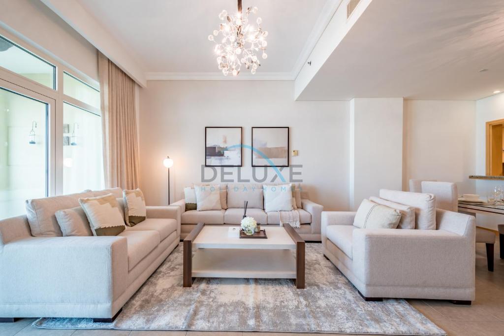 Photo #1 of Elegant 1BR Apartment with Sea View in Al Haseer, Palm Jumeirah by Deluxe Holiday Homes in Dubai, United Arab Emirates
