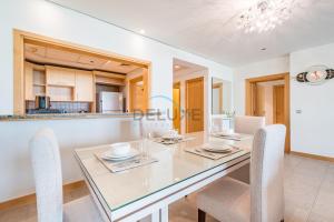 Photo #5 of Elegant 1BR Apartment with Sea View in Al Haseer, Palm Jumeirah by Deluxe Holiday Homes in Dubai, United Arab Emirates