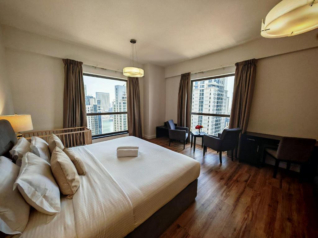 Photo #1 of Stunning 5 plus 1 BR Apartment on JBR Beach with Marina View on High Floor Plus Maid's Room, Near Mall, Metro & Cinemas - By Sunkissed Holiday Homes in Dubai, United Arab Emirates