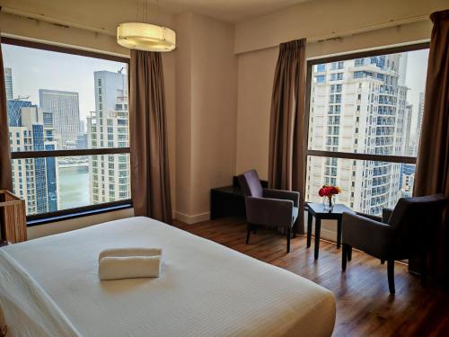 Photo #2 of Stunning 5 plus 1 BR Apartment on JBR Beach with Marina View on High Floor Plus Maid's Room, Near Mall, Metro & Cinemas - By Sunkissed Holiday Homes in Dubai, United Arab Emirates