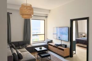 Photo #5 of FavDubai presents 2BR apartment in The Heart of JBR and Dubai Marina 150 m to JBR Beach with famous Ain Dubai view the biggest ferris wheel in the world Swimming pool access, air-conditioned gym, free parking & Housekeeping in Dubai, United Arab Emirates