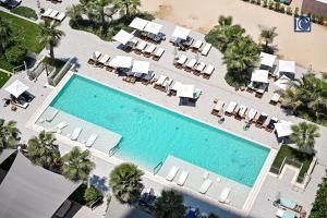 Photo #4 of Luxury Escapes - Exquisite 3BR plus Maid, Full Sea View in JBR in Dubai, United Arab Emirates