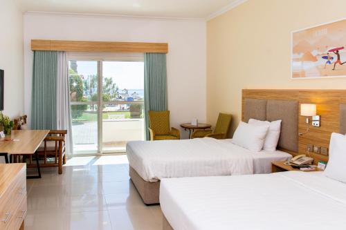Photo #2 of Sandy Beach Hotel & Resort in العقة, United Arab Emirates