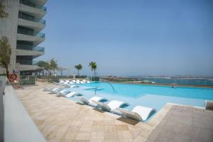 Photo #4 of Luxury Living in Emaar Beachfront w Private Beach in Dubai, United Arab Emirates