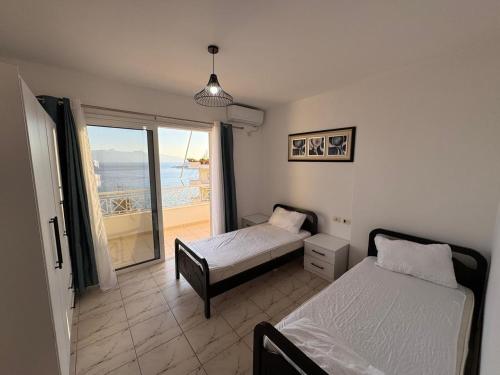 Photo #2 of Beachfront 2 Bedrooms Apartment in Saranda, Albania