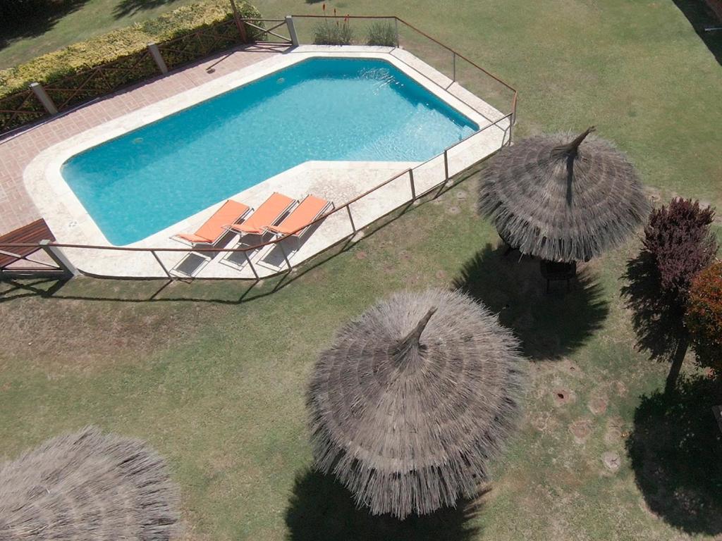 Photo #1 of Las Magnolias - Casas de Campo in Mina Clavero, Argentina