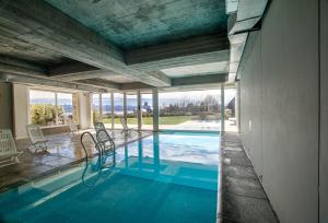 Photo #4 of Bariloche costa del lago Ollagua, vista al lago panoramica, piscina, cochera in San Carlos de Bariloche, Argentina