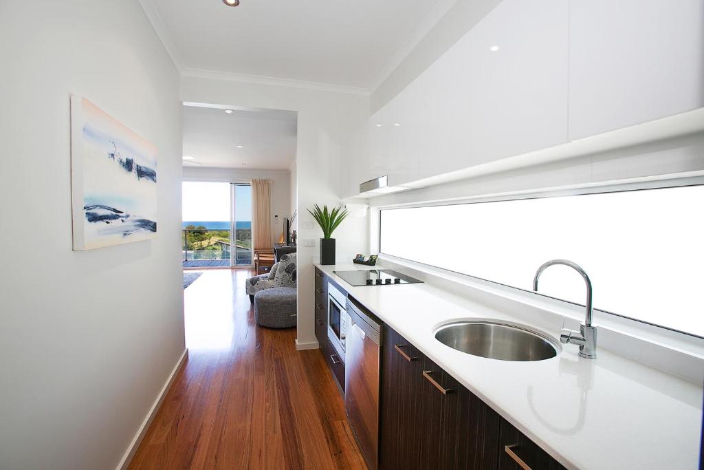 Photo #1 of Caves Coastal Bar & Bungalows in Caves Beach, Australia