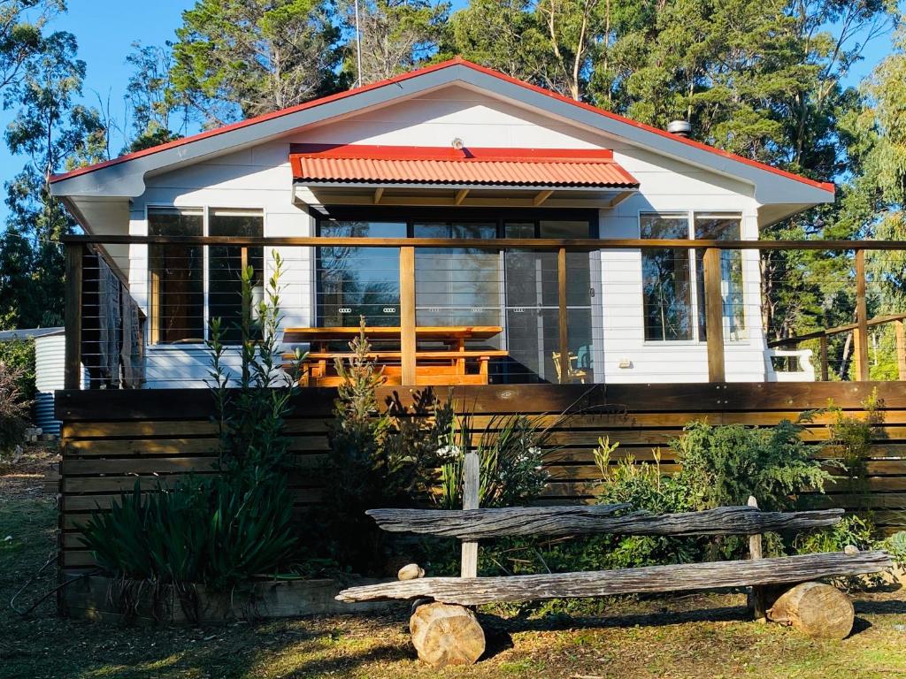 Photo #1 of Fully fenced, wrap around decks, water on 3 sides in Lunawanna, Australia