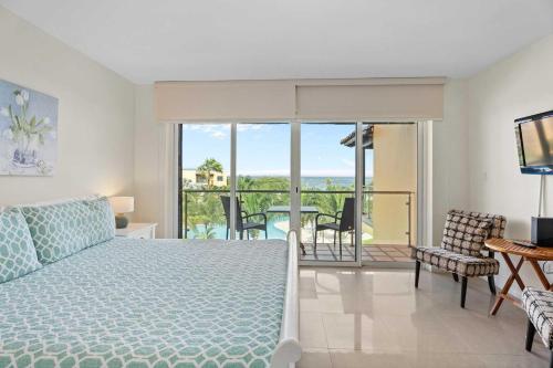 Photo #2 of Beachfront - Beach Garden Studio - E124-1 in Oranjestad West, Aruba