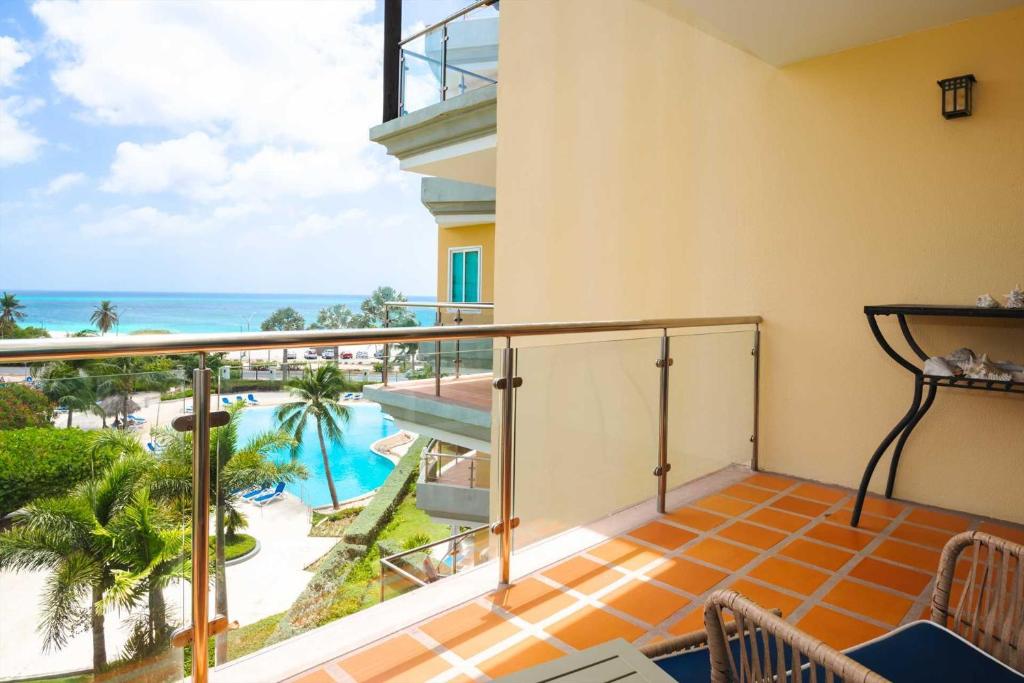 Photo #1 of Beachfront - Best View 2BR condo - E422-2 in Oceania Residences, Aruba