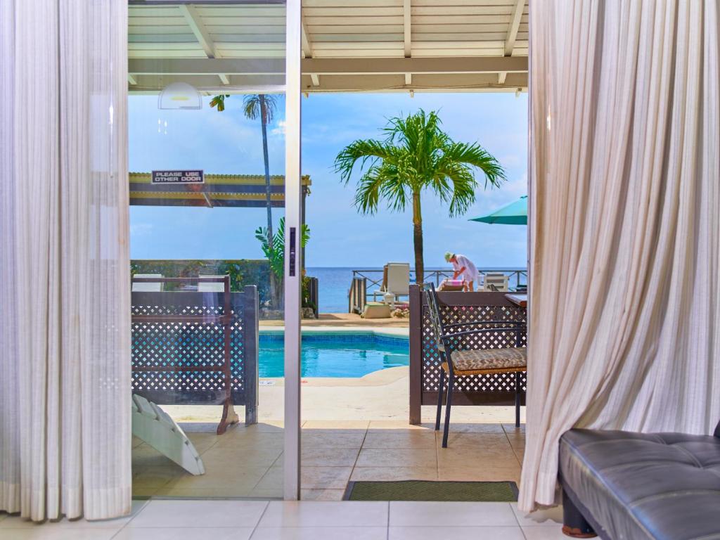 Photo of Tropical Sunset Beach Apartment Hotel in Holetown, Barbados