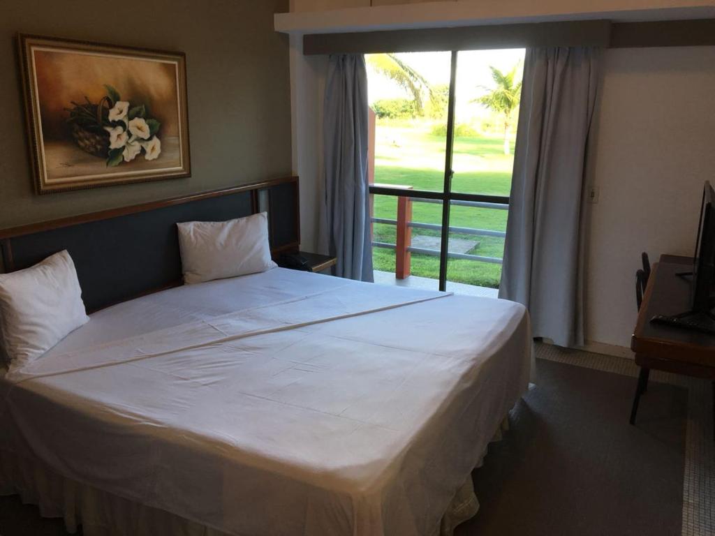 Photo of Coqueiral Praia Hotel in Coqueiral, Brazil