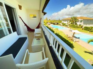 Photo #5 of Apartamento amplo de frente para o mar em Resort in Entre Rios, Brazil