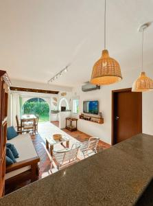 Photo #6 of Apto estilo casa em condomínio na beira da praia in Praia Brava, Brazil
