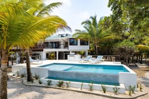 Photo #4 of Photo Perfect-Beachfront 2 Bedroom-Infinity Pool in Placencia, Belize