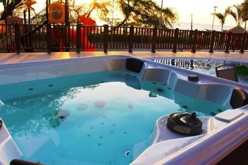 Photo #3 of Exclusivo club de playa con acceso directo a la playa de pozos colorados, cuenta con piscinas olímpicas, para niños, restaurante, jacuzzi, sauna, turco, salón de juegos, simulador de golf, spa, transporte interno, bar, etc. in Santa Marta, Colombia