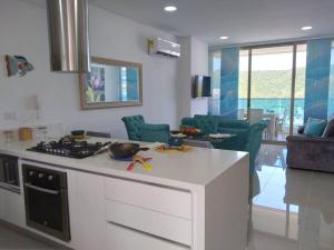 Photo #4 of Exclusivo club de playa con acceso directo a la playa de pozos colorados, cuenta con piscinas olímpicas, para niños, restaurante, jacuzzi, sauna, turco, salón de juegos, simulador de golf, spa, transporte interno, bar, etc. in Santa Marta, Colombia