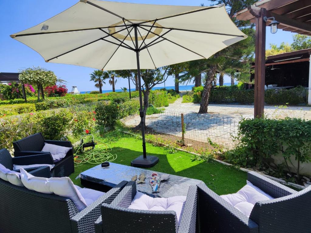 Photo of Pampering Beach Dream, A Stunning Luxury Retreat at Yialos Village in Meneou, Cyprus