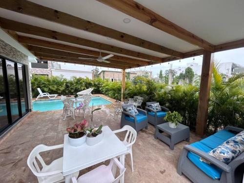 Photo #2 of Beautiful Home and Pool near beach , BBQ Juan Dolio metro country Club in Juan Dolio, Dominican Republic