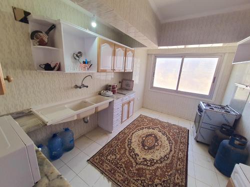 Photo #2 of Hotel appartment sea view free wifi 3 bedrooms 2 full bathrooms 4th floor Bellevue village agami alexandria families are preferred available all year days with 5 heavy blankets in سوق الترك, Egypt