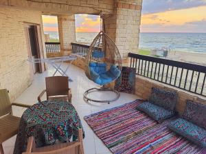 Photo #6 of Hotel appartment sea view free wifi 3 bedrooms 2 full bathrooms 4th floor Bellevue village agami alexandria families are preferred available all year days with 5 heavy blankets in سوق الترك, Egypt