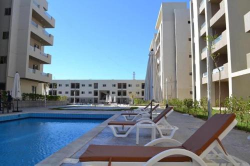Photo #3 of Chalet on the ground floor with a private garden in Grand Hills Village for families شاليه بالطابق الارضى مع جنينه خاصه بقريه جراند هيلز للعائلات in ADH Dheraa Al Bahri, Egypt