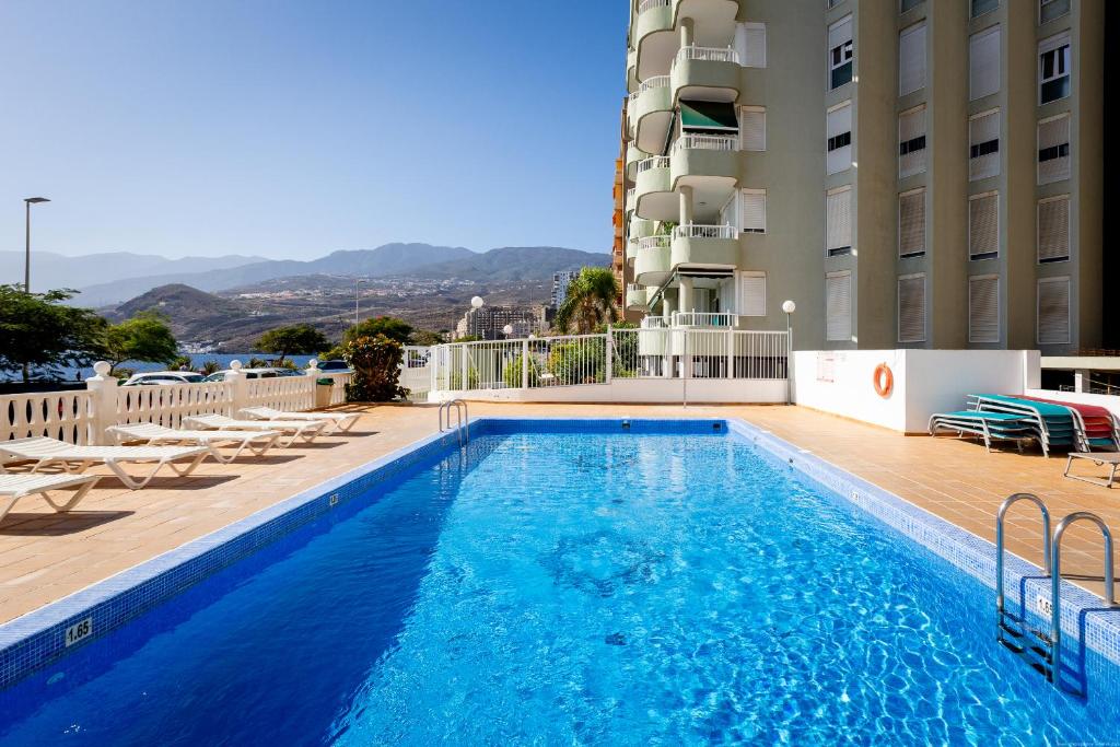 Photo of Beachfront with communal swimming pool and parking in Radazul, Spain