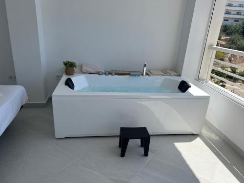 Photo #2 of Modern apartment sea view with private jacuzzi in Villajoyosa, Spain