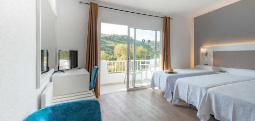 Photo #2 of Osprey Menorca Hotel in Cala en Porter, Spain