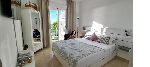 Photo #2 of Seaside Serenity - Stylish Apartment with Spectacular Views in Estepona, Spain