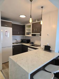 Photo #5 of Seaside Serenity - Stylish Apartment with Spectacular Views in Estepona, Spain