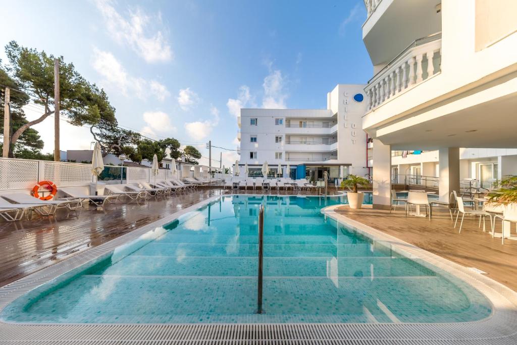 Photo of Welikehotel Triton Beach in Cala Rajada, Spain