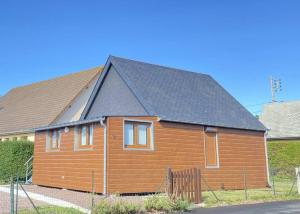 Photo #3 of Chaleureux chalet en bord de mer in Merville Franceville, France