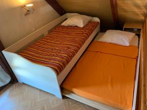 Photo #4 of Chaleureux chalet en bord de mer in Merville Franceville, France