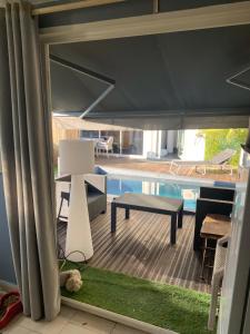 Photo #6 of Exceptionnel 3 logements de plein pieds pouvant accueillir jusqu à 8 personnes à 2 pas de la plage et du centre ville dans une résidence de bien être avec jacuzzi et piscine chauffée in Décines Charpieu, France