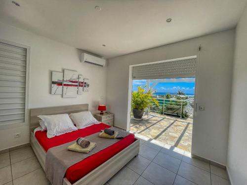 Photo #2 of Les villas "Fenêtres Sur Plage" - Villas Créoles de charme , vue exceptionnelle face mer et plage & piscines privées à débordement in Saint François, Guadeloupe