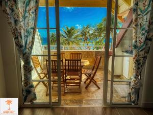 Photo #5 of Ti Kaz Funky Host -T3 vue mer prémium 3 étoiles - Village vacances Sainte Anne Guadeloupe in Sainte Anne, Guadeloupe