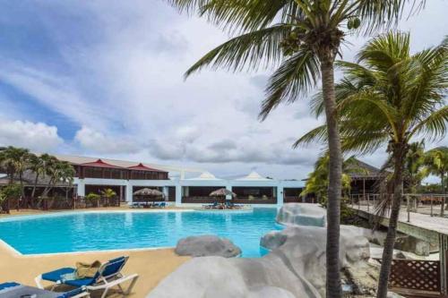 Photo #2 of Studio Kaza Loulou au Manganao Au pied de la plage et piscine in Saint François, Guadeloupe