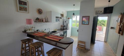 Photo #3 of 75m2, 2 bedrooms ,beachfront, 2 garden pools in Saint François, Guadeloupe