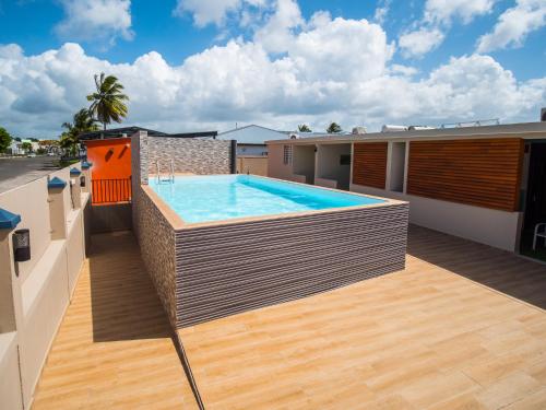 Photo #2 of Evasion en plein cœur de la ville T2 Jacuzzis Sauna et piscine au centre de Port-Louis in Port Louis, Guadeloupe