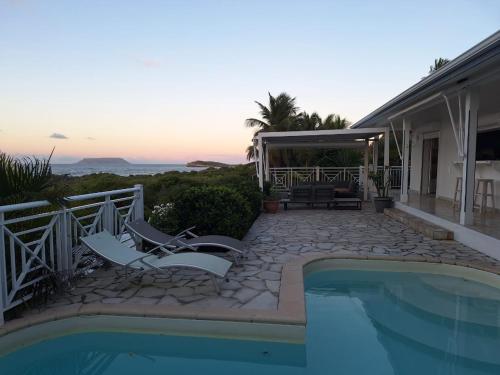 Photo #2 of Villa Muscade guadeloupe, piscine, vue mer et accès plage in Saint François, Guadeloupe