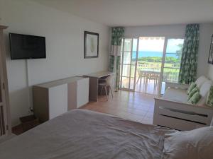 Photo #5 of Grand Studio vue mer exceptionnelle, piscines, plages. in Sainte Anne, Guadeloupe