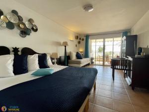 Photo #6 of Village Vacances Sainte Anne - Vue exceptionnelle Piscine et Plage Vue mer - Barbadine 1010 by Studios Barbadine in Sainte Anne, Guadeloupe
