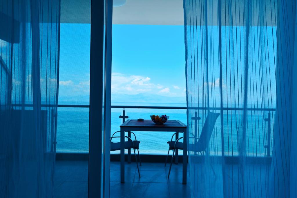 Photo #1 of NEW TIMES SEAFRONT HOTEL APARTMENTS MELISSI in Melission, Greece