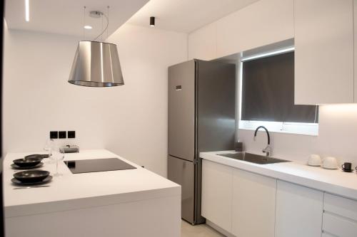 Photo #2 of Seafront Apartment by C2C Architects in Porto Rafti, Greece